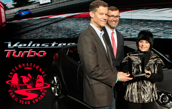 Hyundai executives accept 2012 International Sporty Coupe of the Year for the 2012 Hyundai Veloster from Road & Travel Magazine